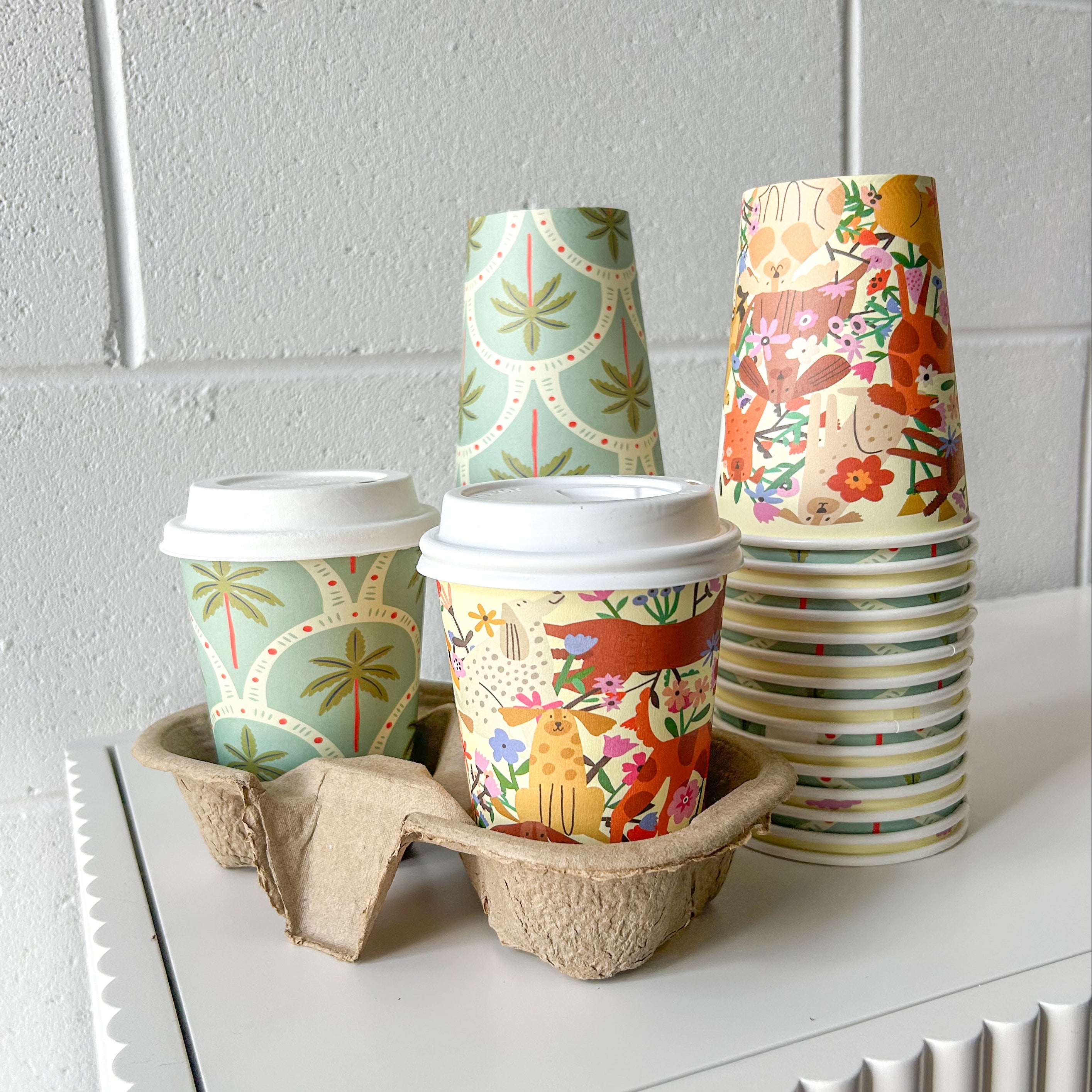 Creative Cafe Co 12oz Dogs & Palms coffee cup with cup tray