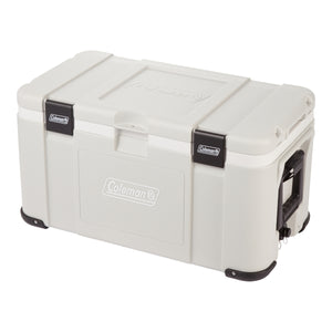 Coleman Glacier 50L Hard Cooler Grey, three quarter view of the off-white body with two black latches, black end handle and corner bumpers