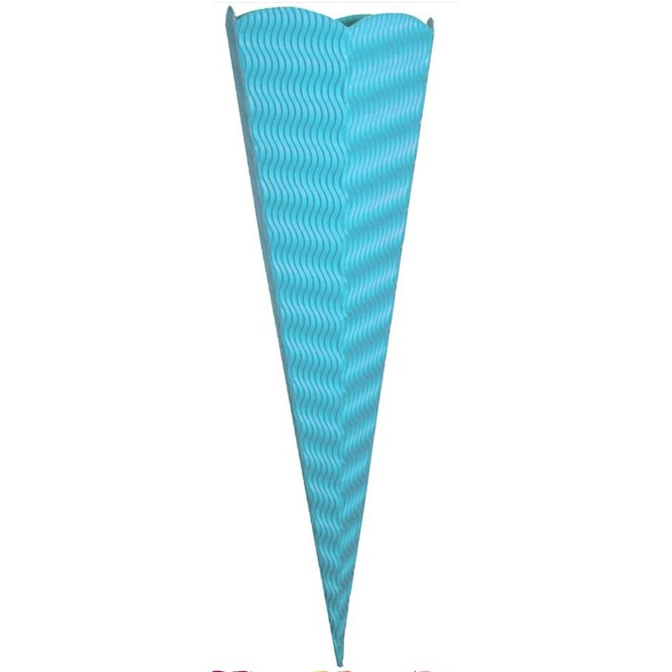 Light blue Goldbuch craft school cone with a wavy corrugated surface and a scalloped top edge, standing upright on a white background