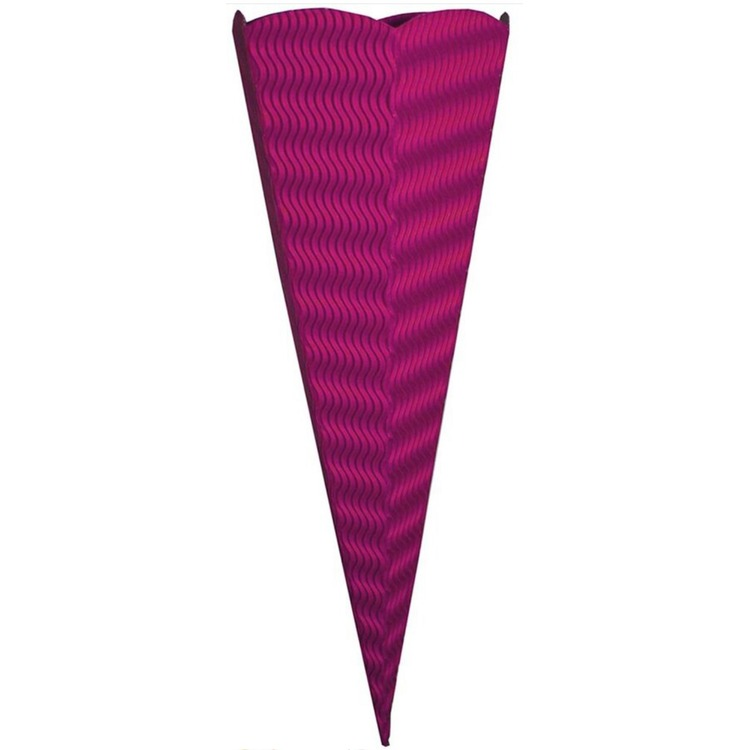 Magenta Goldbuch craft school cone with a wavy corrugated surface and a scalloped top edge, standing upright on a white background