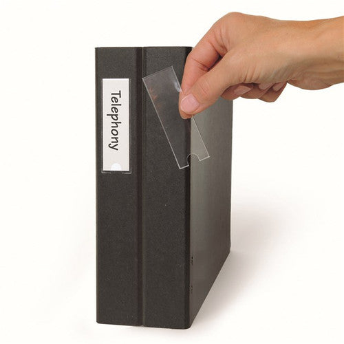 3L 100852414 clear self-adhesive label holders 25x102mm, pack of 12, shown flat with finger-hole detail
