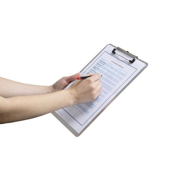 Hand writing with a red pen on a form held by the lever clip of the Marbig A4 aluminium clipboard 43300, board held at an angle