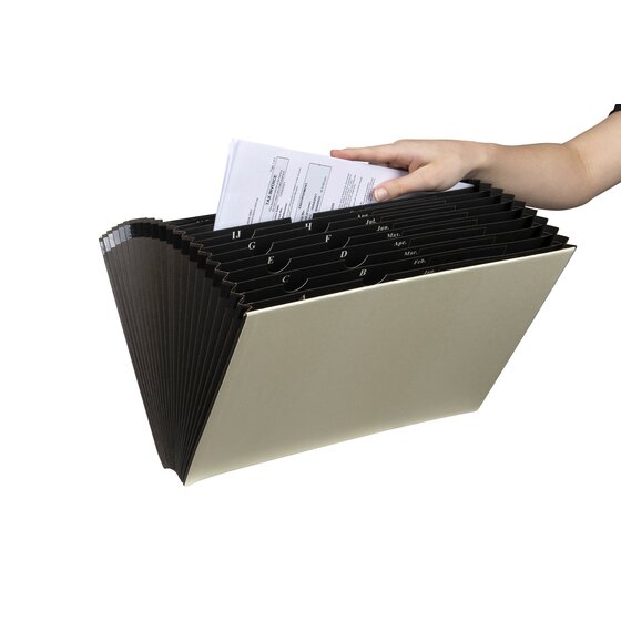 Hand placing a sheet into the black pockets of an ivory Marbig expanding file with no flap