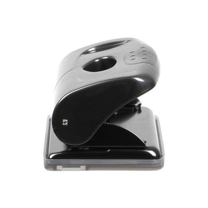 Small black two hole punch with a textured grip and clear base, three quarter side view
