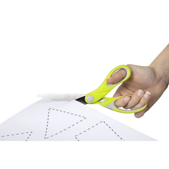 Close up of a hand cutting paper printed with dashed triangles using a lime and grey Comfort Grip pair, the ACCO in use photograph for code 975431