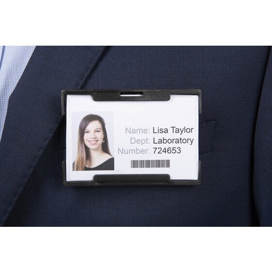 Black Rexel rigid card holder clipped to a navy suit jacket pocket, holding a landscape sample staff card with photo and barcode