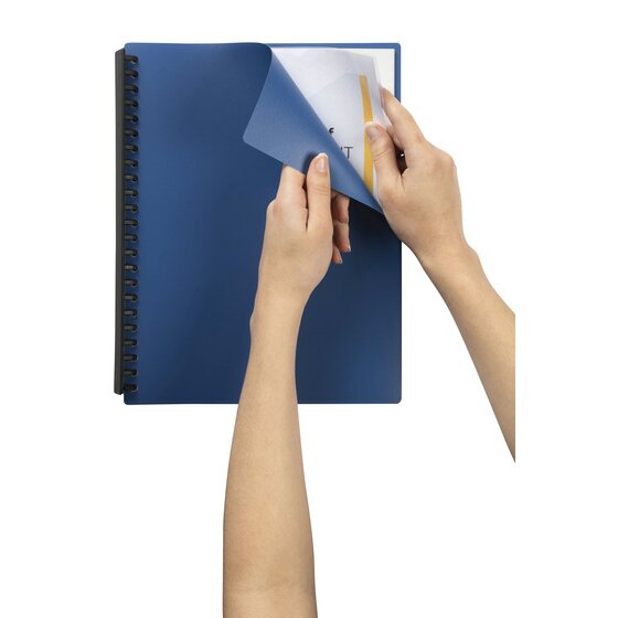 A blue Marbig forty pocket A4 display book held in two hands while a printed page is slid into the first clear pocket behind the blue front cover.