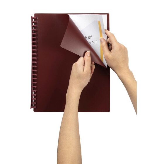 A maroon Marbig A4 refillable display book held in two hands while a printed page is slipped into the first clear pocket under the deep red front cover.