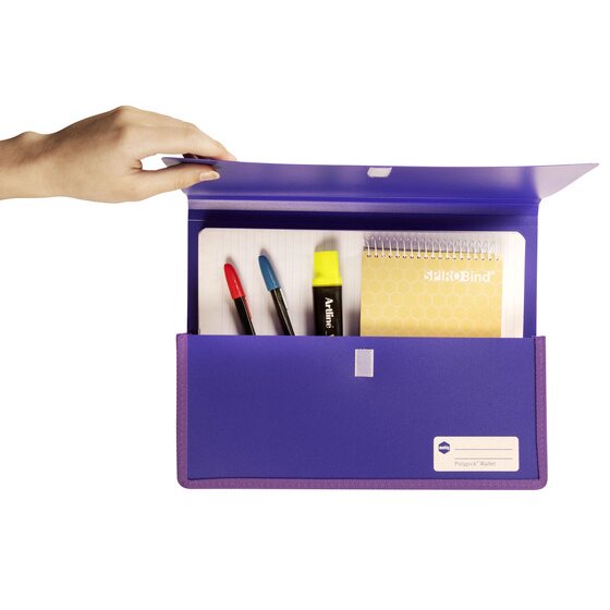 A hand lifting the flap of a purple Marbig Polypick heavy duty A4 wallet to show a spiral notebook, two markers and a highlighter stored inside it