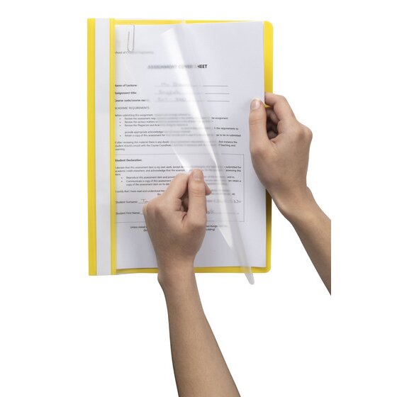Hands lifting the clear front cover of a yellow Marbig A4 economy flat file to reach a printed assignment cover sheet held inside on the fastener.