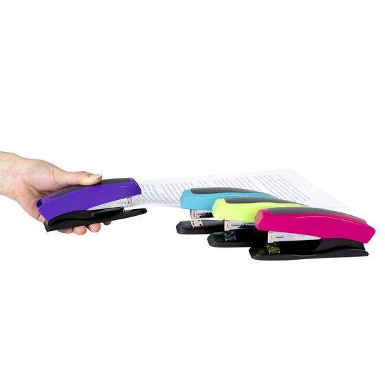 A hand using a purple Marbig half strip stapler on a stack of paper, with blue, lime and pink staplers behind