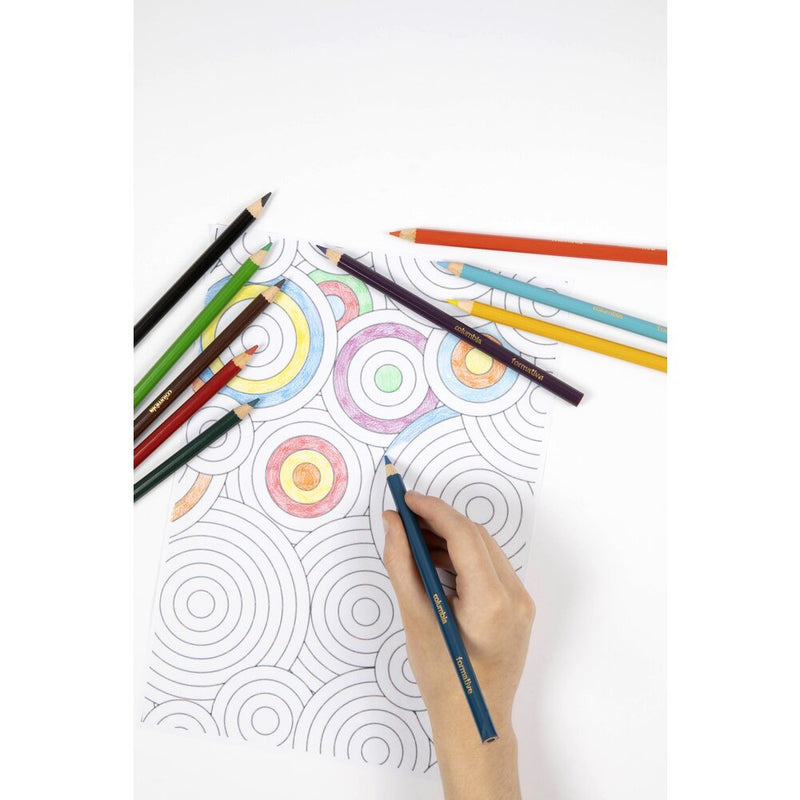 Hand colouring a page of concentric circles with a Columbia Formative colour pencil, more pencils lying across the sheet
