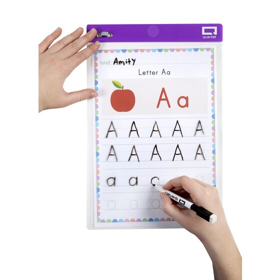 Hand writing on a letter tracing worksheet inside a Quartet Flex A4 pocket sleeve with a purple top edge