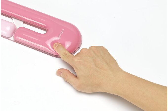 Pink handheld device with a hand pressing a button on a white background