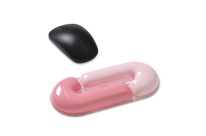Black computer mouse and pink and clear plastic item on a white background