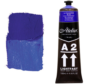Chroma A2 Heavy Body Acrylic Ultramarine Blue 120ml tube with Ultramarine Blue shoulder label, beside a painted swatch of a strong violet-blue that lightens to bright periwinkle
