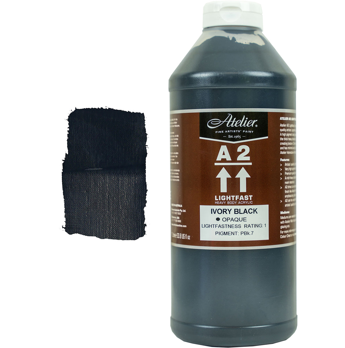Chroma A2 Heavy Body Acrylic Ivory Black 1 litre bottle with white cap and brown Atelier A2 label, beside a painted swatch of a dense black that thins to dark charcoal