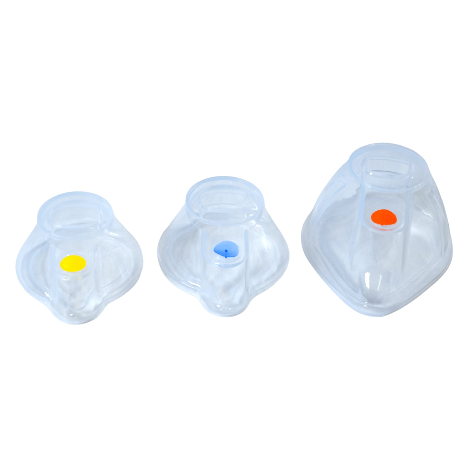 Three transparent training masks in different sizes displayed together against a white background. Coloured identifiers distinguish the yellow, blue and orange models, illustrating a training mask family designed to support demonstrations across different face sizes and age groups. The adult version is represented by the larger orange identified mask.