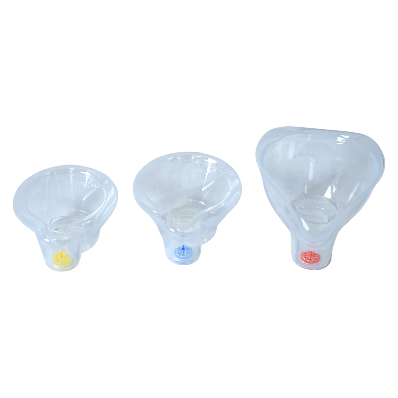 AeroLearn training mask size range displayed against a white background, showing three transparent masks in different dimensions. The compact infant model is positioned alongside larger masks, with yellow, blue and red identifiers helping educators distinguish mask sizes when preparing age specific respiratory training activities.