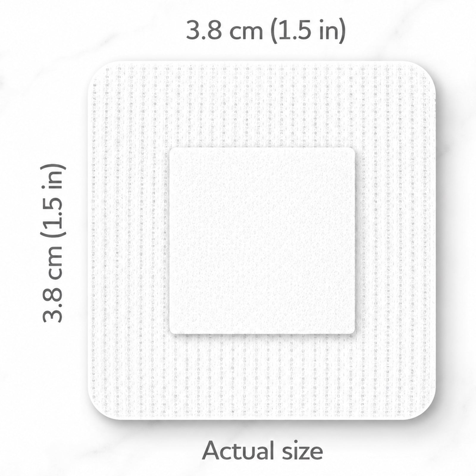 Close view of an AeroPlast Sensitive Silicone square patch showing its 3.8 x 3.8cm dimensions and central absorbent wound pad.