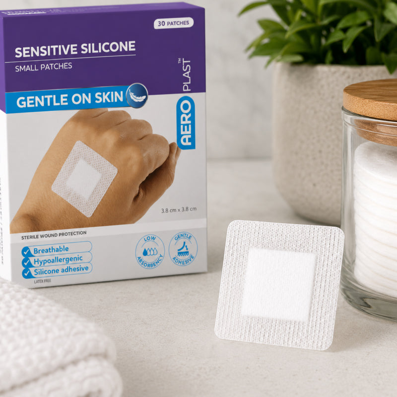 AeroPlast Sensitive Silicone Small Patches box with an individual square dressing displayed beside it, highlighting the breathable white fabric and central wound pad.