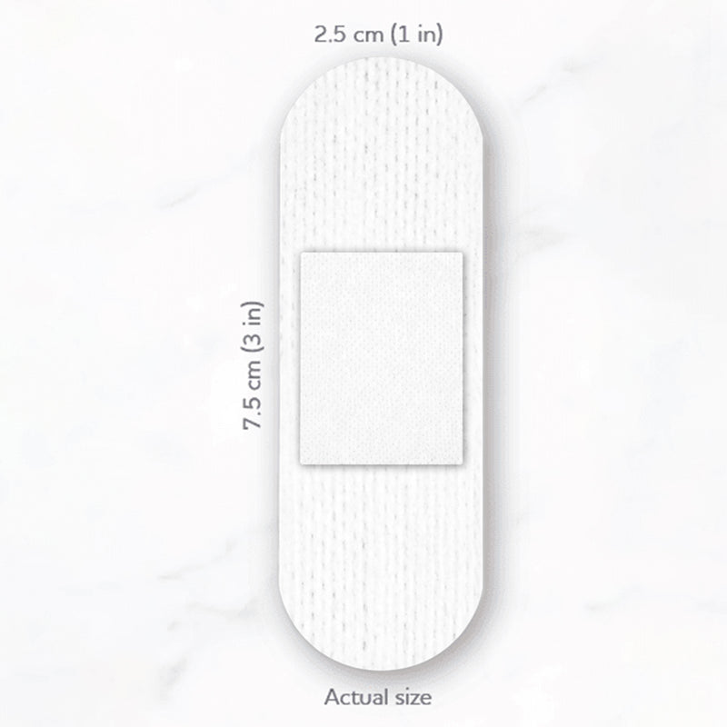Actual size presentation of the white AeroPlast Sensitive Silicone Extra Wide Bandage, clearly showing its rounded strip shape, central wound pad and dimensions of 2.5 x 7.5cm.