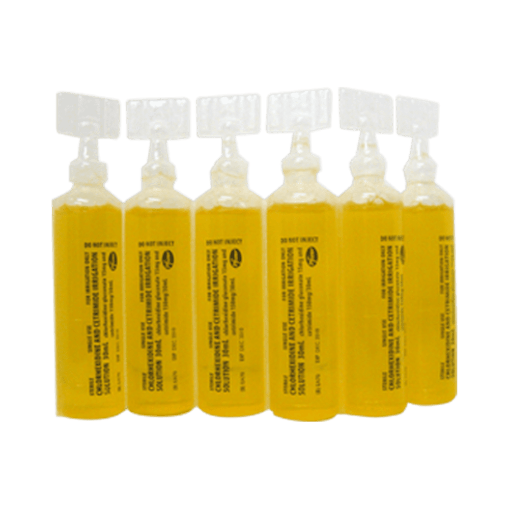 Six clear plastic ampoules of yellow chlorhexidine and cetrimide solution, 30mL each, standing in a row