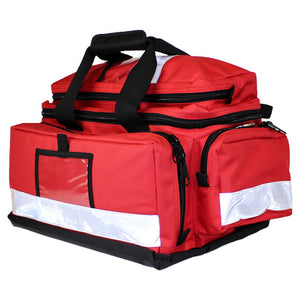 Red trauma first aid bag with black carry handles, a reflective band along the base, zipped end pockets and a clear document window on the front