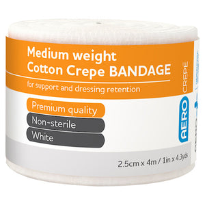 Roll of medium weight cotton crepe bandage with an orange and white label printed for support and dressing retention, premium quality, non-sterile, white, 2.5cm x 4m