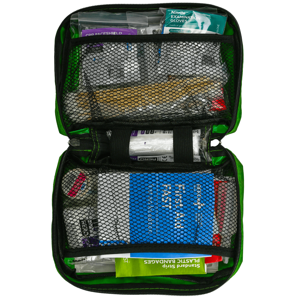 The case opened flat, showing the contents held in mesh and elastic pockets on both sides