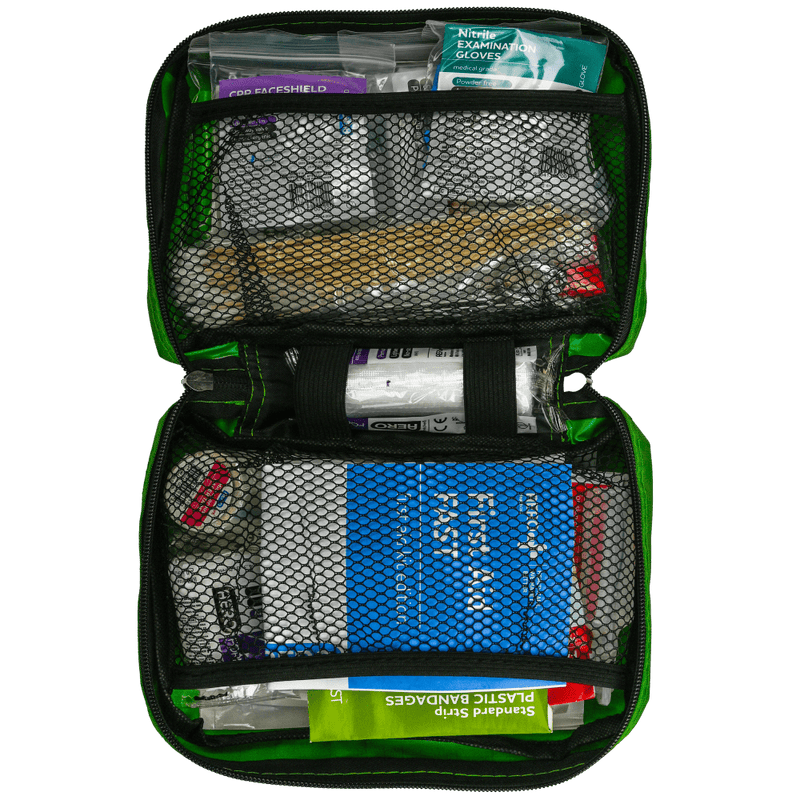 The case opened flat, showing the contents held in mesh and elastic pockets on both sides