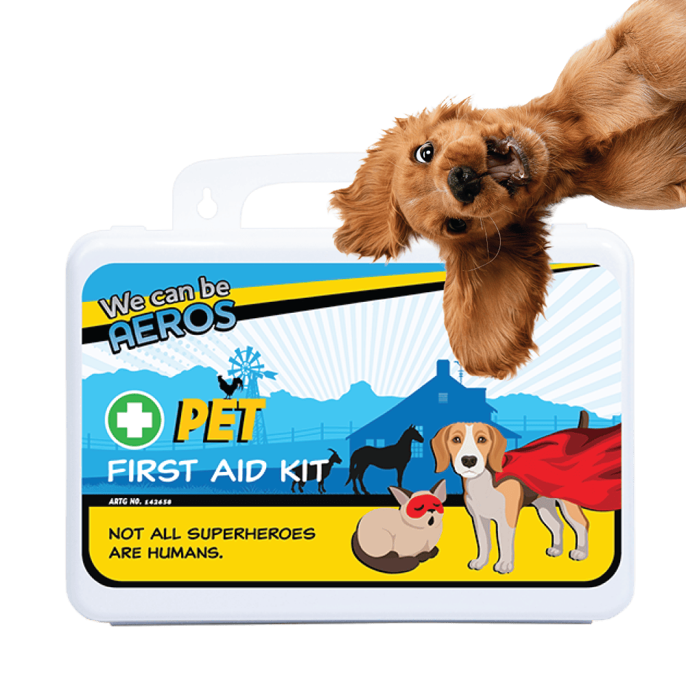 White plastic pet first aid case printed We can be AEROS with dog artwork and the line Not all superheroes are humans, photographed with a spaniel above it