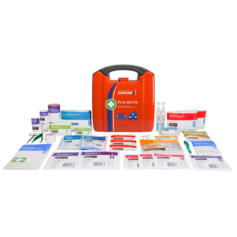 The orange Defender case standing behind the kit contents laid out in rows