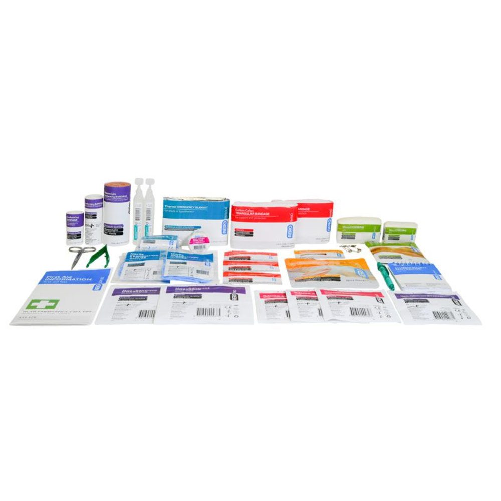 The refill contents laid out in rows without a case, showing bandages, dressings, plastic strips and wipes