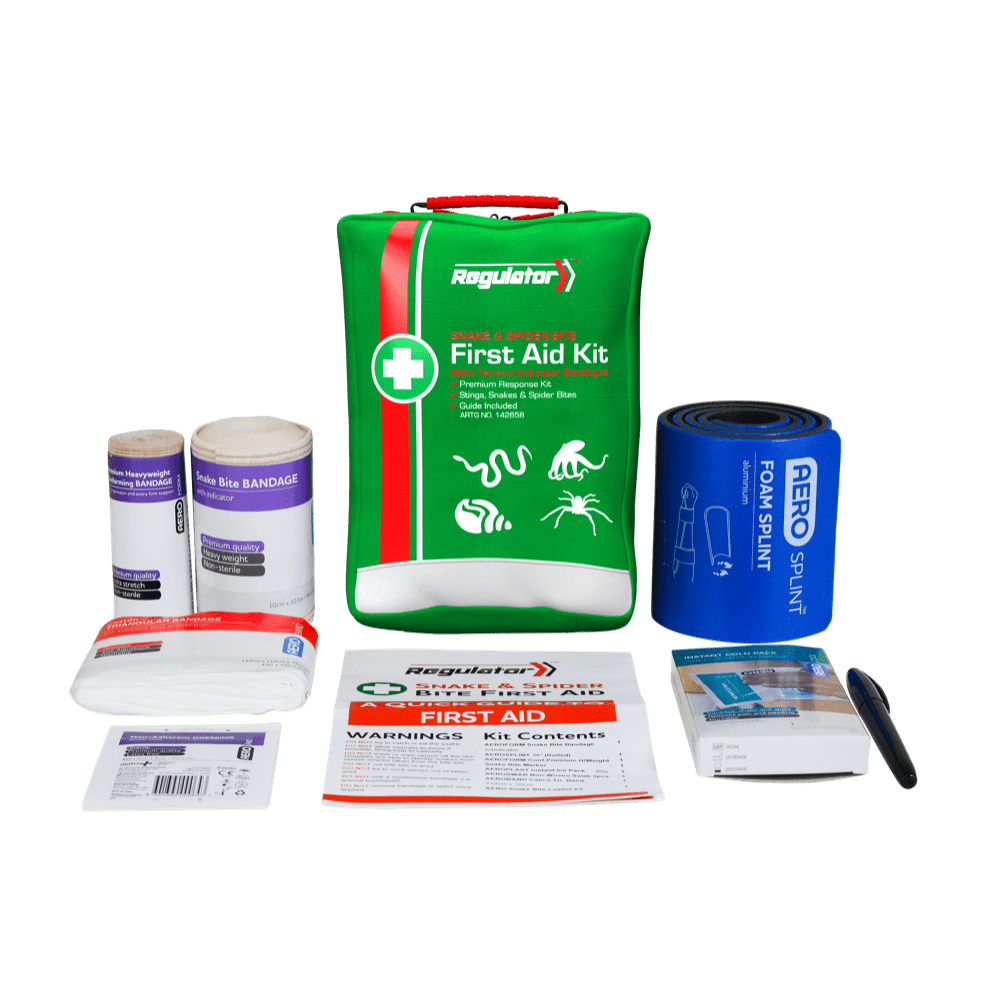 The green soft pack standing behind its contents, including two indicator bandages, a triangular bandage, a dressing and a guide