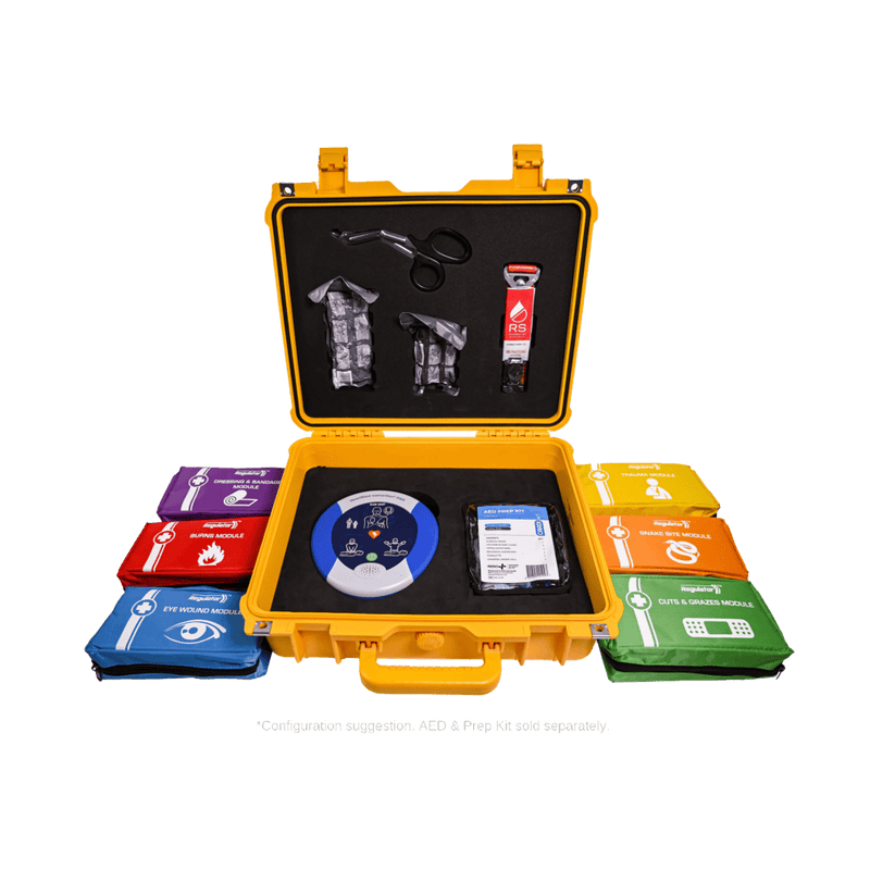 The open yellow case showing the coloured modules and a trauma insert in the lid