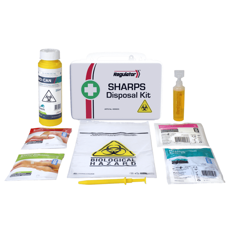 The white sharps case standing behind its contents, including a sharps container, a biohazard bag, wipes and forceps