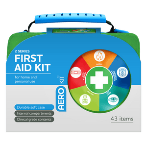 Green soft case with a blue moulded handle and an AeroKit colour wheel of treatment icons, printed 2 Series First Aid Kit for home and personal use, durable soft case, internal compartments, clinical grade contents, 43 items