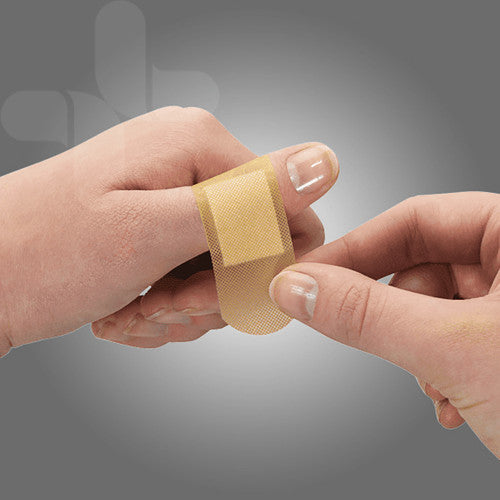 A plastic plaster strip being peeled open and applied to a finger