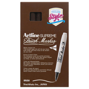 Front of an Artline Supreme Brush Marker box with dark brown markers showing through the window