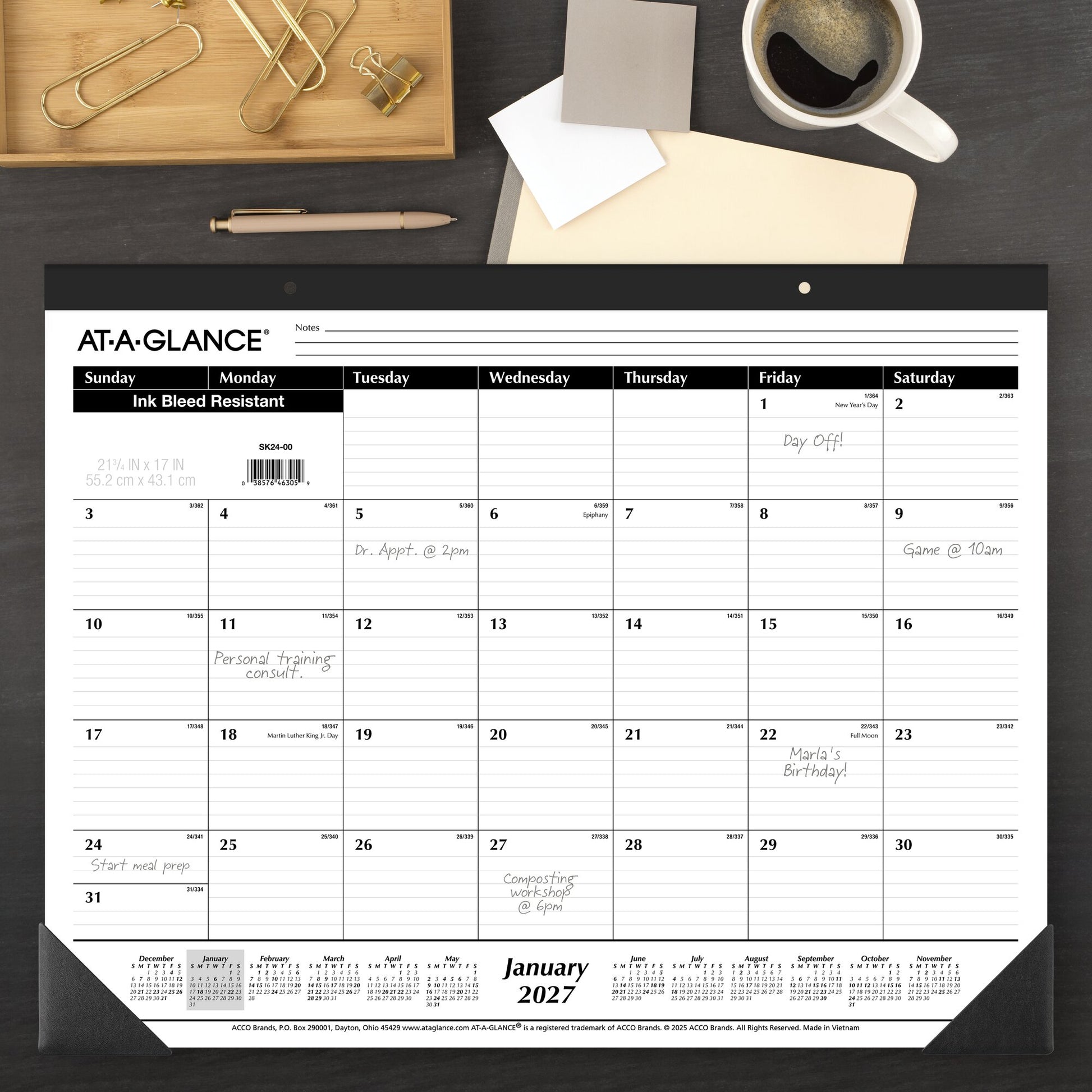 At-A-Glance Recycled Monthly Desk Pad 2027 552 x 431mm opened to show the printed monthly grid and the dated planning layout inside.