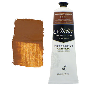 Chroma Atelier Interactive Acrylic Paint 80ml Raw Umber Yellowish: tube with a chocolate brown colour band beside a painted swatch of a golden caramel brown that brightens where it is spread thin
