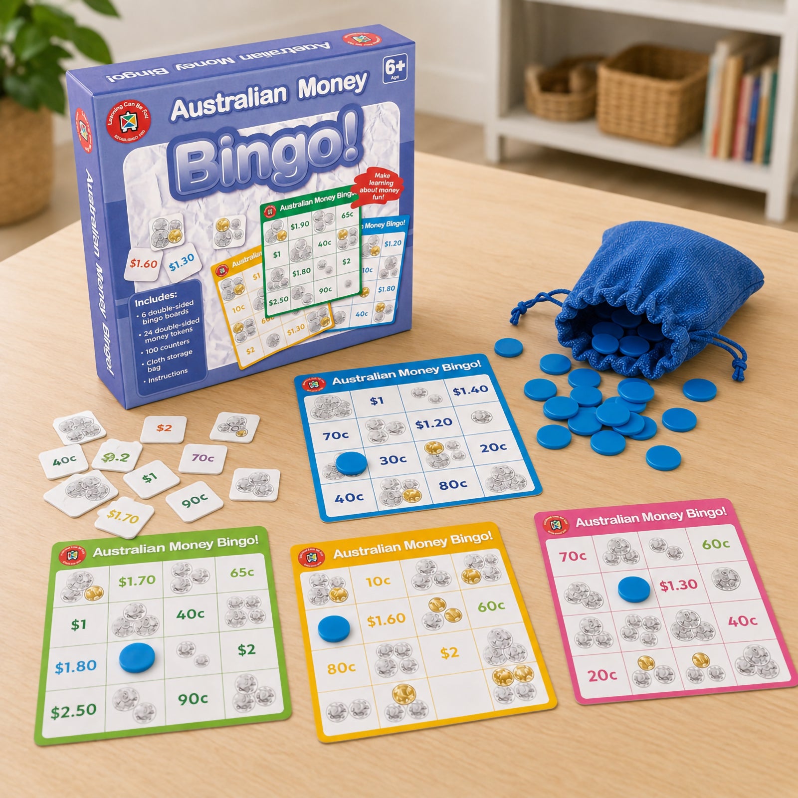 Complete Australian Money Bingo game displayed with retail packaging, bingo boards, money tokens, blue counters and storage bag. The image clearly showcases all included components, making it ideal for teachers, parents and educators seeking an educational Australian money learning resource.