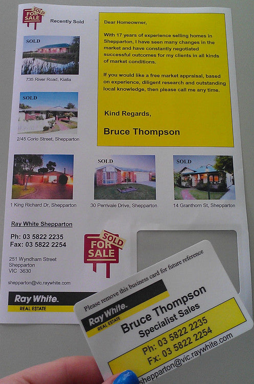 Stack of 100-sheet Bala integrated business card pack for office use