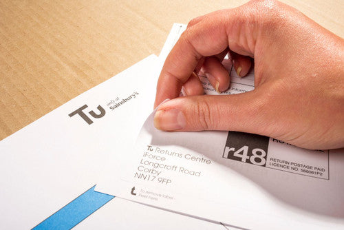 Stack of 500 Bala integrated label sheets in pack