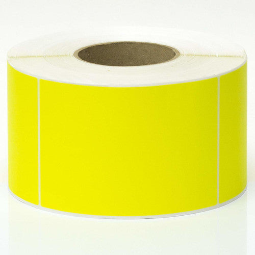 Close-up of perforated yellow thermal transfer labels showing 90x24mm dimensions