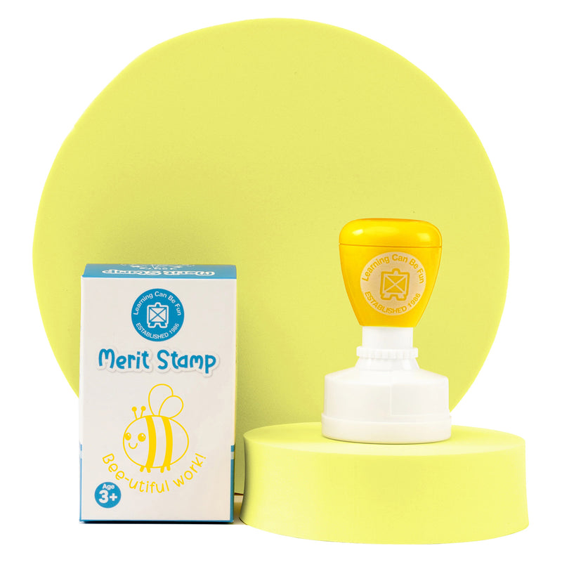 Retail packaging and Bee-utiful Work self inking stamp displayed on a coordinated presentation stand. The packaging showcases the friendly bee illustration and educational reward theme, making it a practical teacher resource.