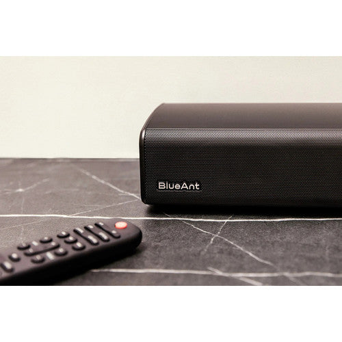 BlueAnt XT120 soundbar placed on a desk in an office media setup