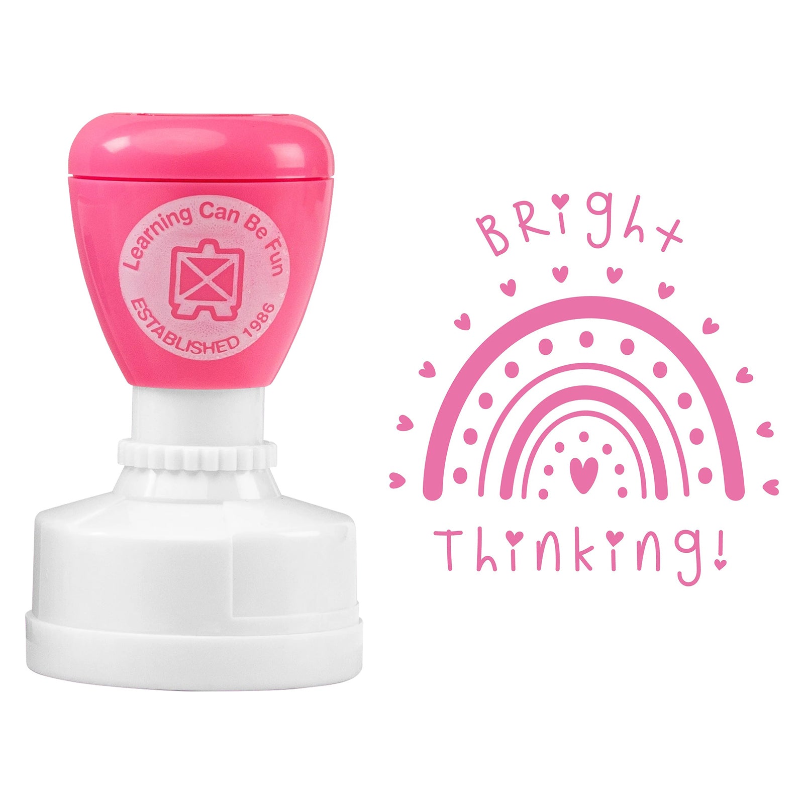 Product close up showing the Bright Thinking merit stamp alongside its detailed pink rainbow artwork. The large 36mm impression and self inking design make it ideal for everyday classroom feedback.
