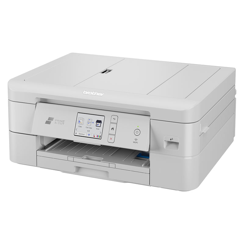 Brother DCP-J1800DW multifunction printer shown at an angle with a partially printed colour brochure exiting the machine. The integrated Print and Cut system enables easy production of smaller format materials while reducing paper waste. The compact footprint, wireless connectivity, and user friendly touchscreen interface make it an excellent solution for home offices, small businesses, and creative professionals.